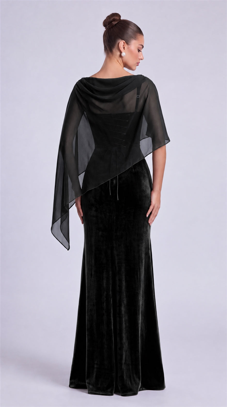 Black rear view of MEXMY velvet mermaid gown with sheer chiffon cape