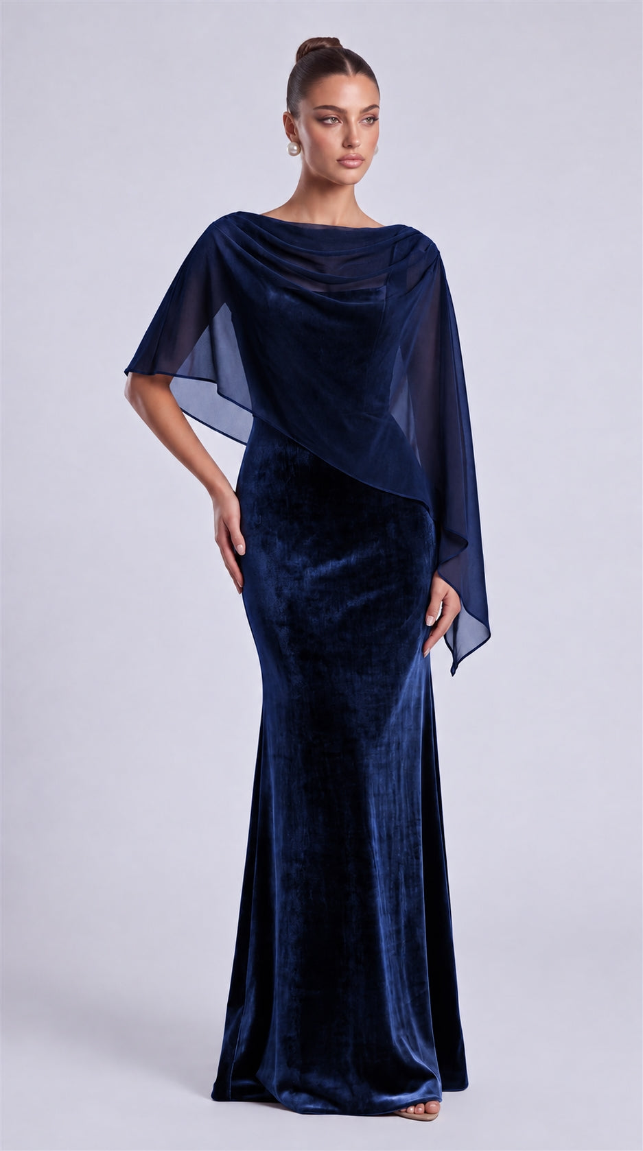 Navy Blue front view of MEXMY velvet mermaid evening dress styled with sheer chiffon cape